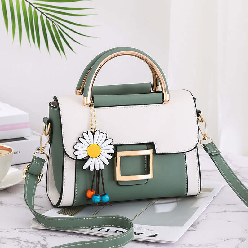 2026 Stylish Women's Shoulder Bag - Versatile Crossbody in green with daisy charm and gold accents.