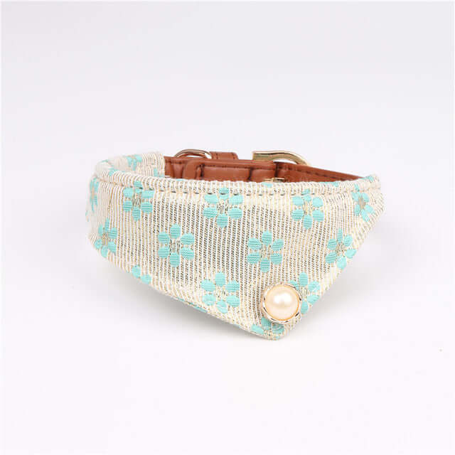 Cute Bowknot Pets Collars in light cream with blue flowers and pearl accent, perfect for stylish pets.