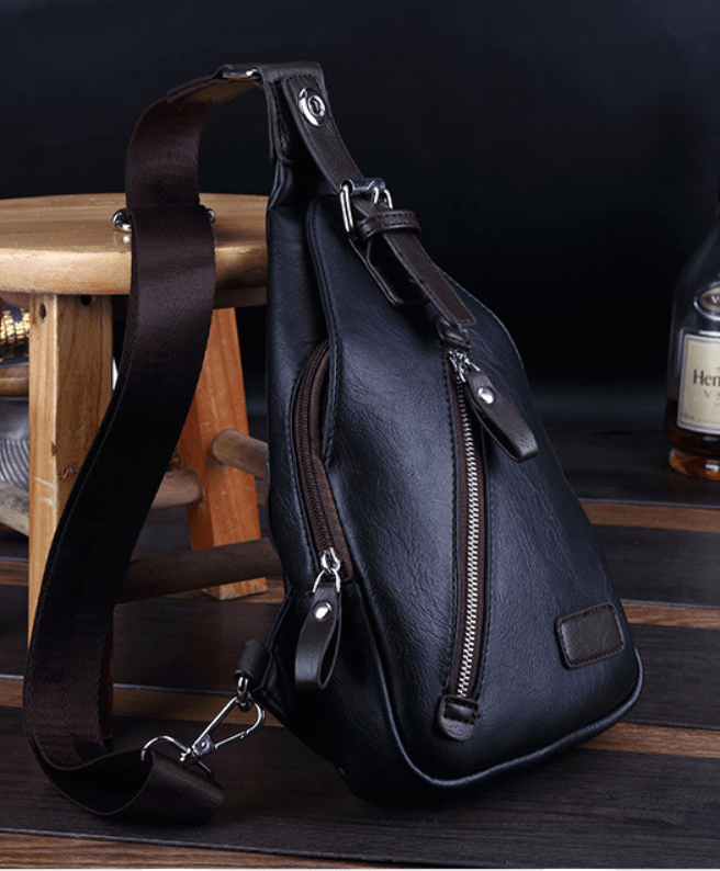 Stylish black versatile waist bag made from high-quality PU leather, perfect for daily use and secure storage.