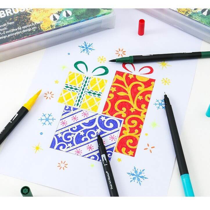 Amazon Dual-Head Watercolor Markers 24 Colors Set used to create colorful gift designs on paper.