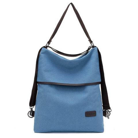 Versatile canvas women's bag in blue color, designed for stylish functionality as a crossbody or backpack.