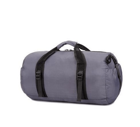 Travel Bag, Luggage Bag, Foldable Gym Bag in stylish grey color with sturdy handles.