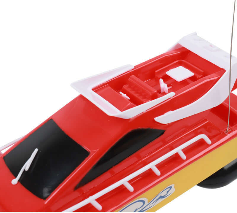Remote control racing boat for kids featuring a vibrant red and yellow design, perfect for water adventures.