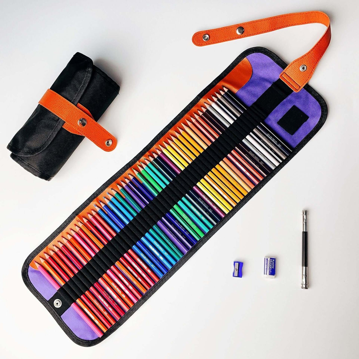 Professional Oil and Water-Soluble Colored Pencils Set in a roll-up case with sharpeners and accessories.