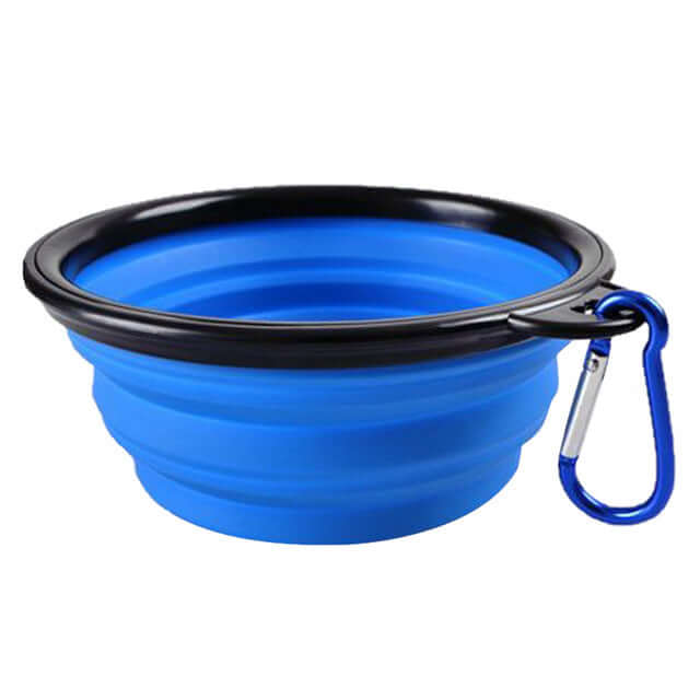 Collapsible Pet Bowl in blue silicone design, easily portable with carabiner for on-the-go pet feeding.