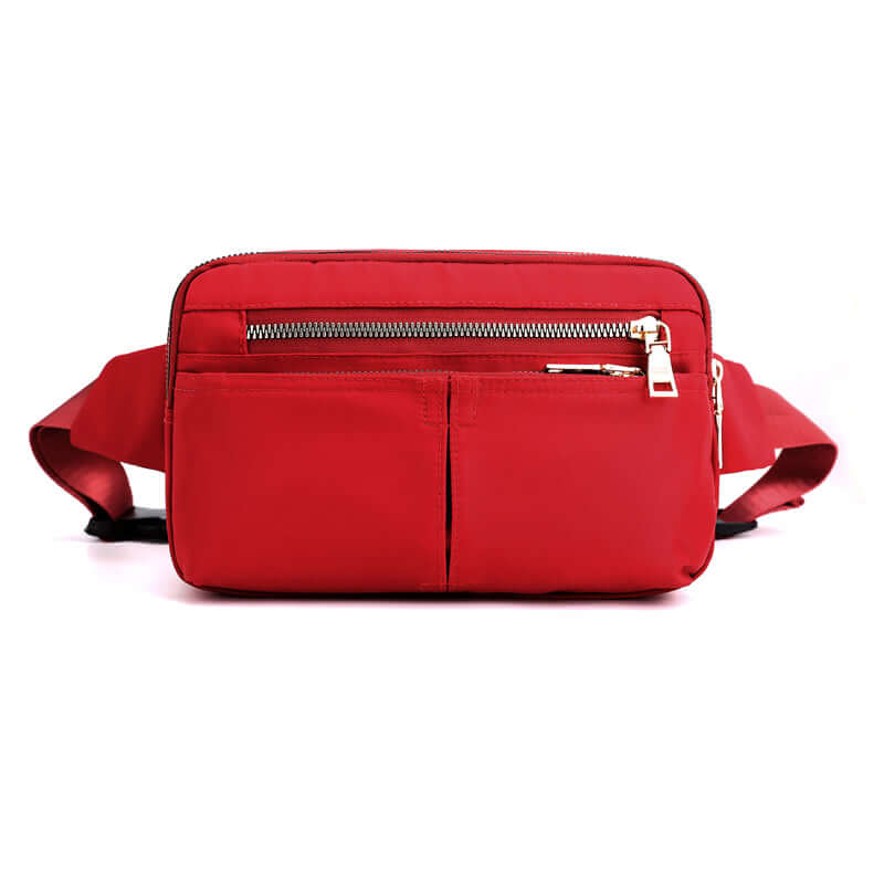Stylish waist bag for outdoor activities in red color with multiple zippered pockets.