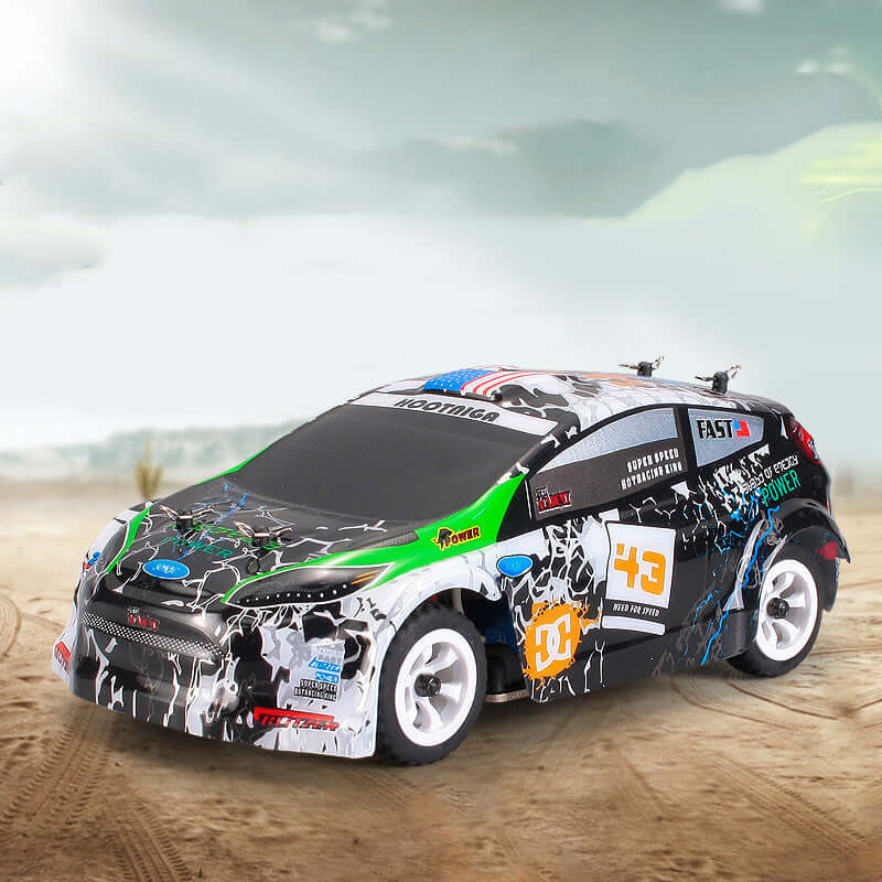 K989 remote control racing car with a vibrant design racing on a dirt track, showcasing its 1:28 scale.