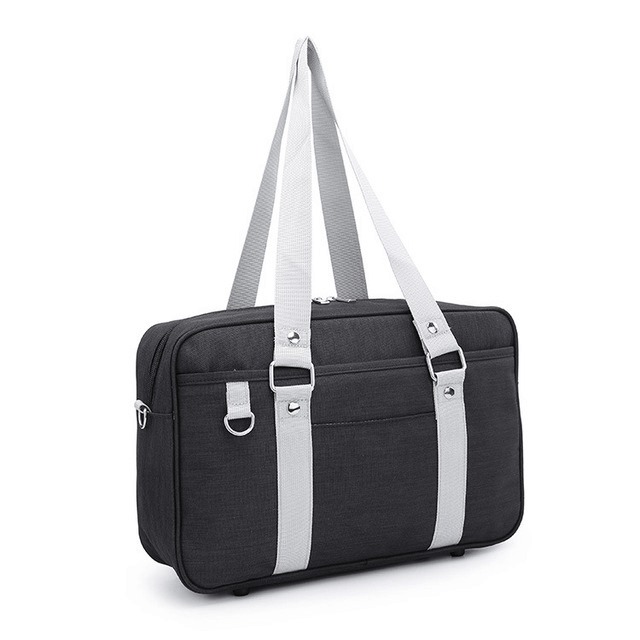 versatile student shoulder bag in black with white straps, ideal for students and professionals.