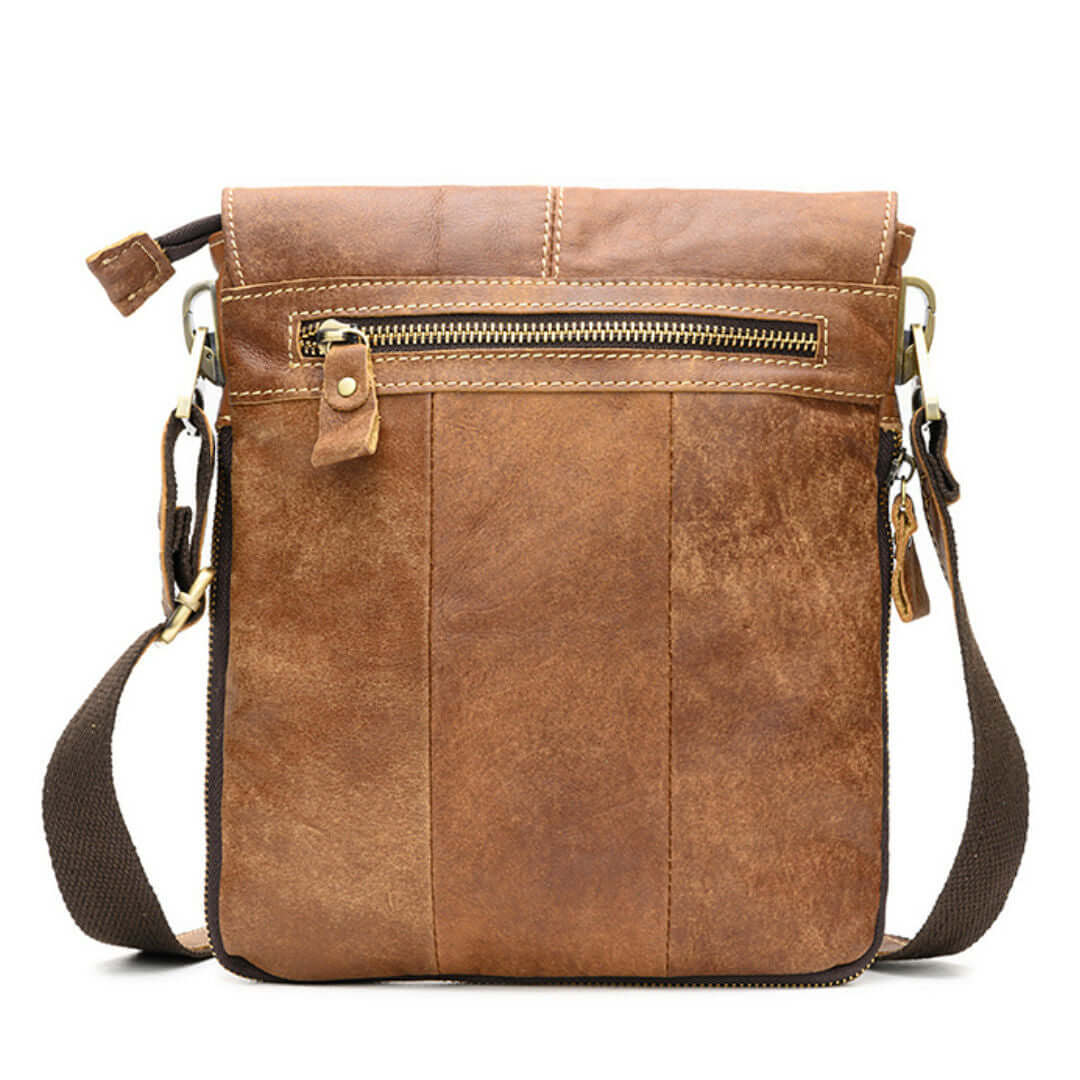 Men's Casual Shoulder Bag made of first layer cowhide leather, featuring a sleek design and adjustable strap.