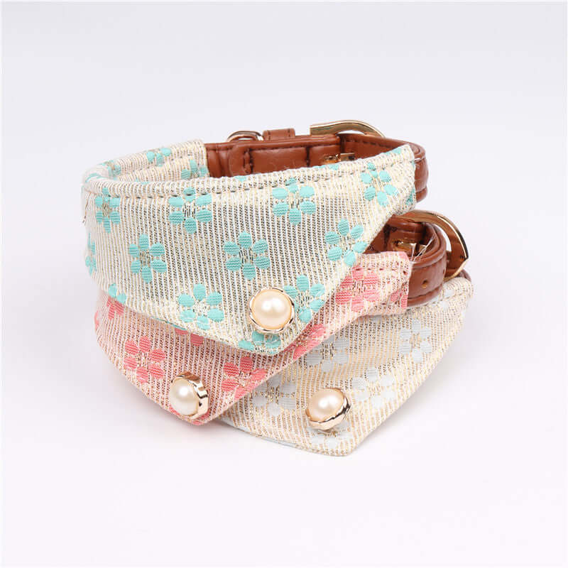 Cute Bowknot Pets Collars featuring floral patterns and pearl accents for stylish pet wear.
