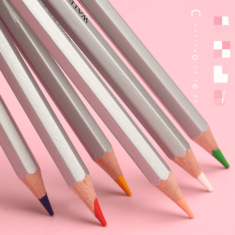 Water-Soluble Colored Pencils for Hand Drawing in various vibrant colors on a pink background.