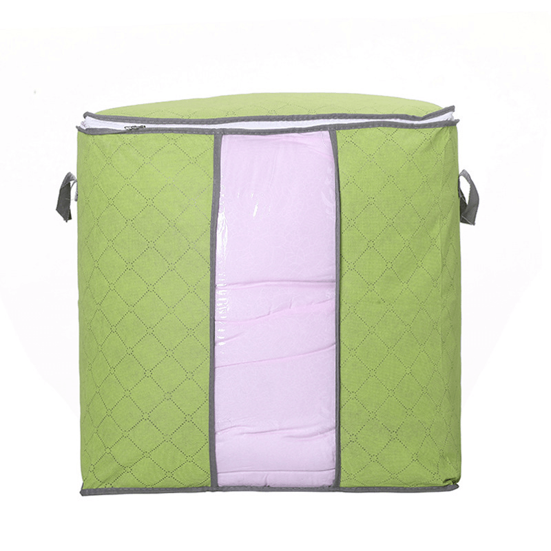 Storage Bag Quilt Storage Bag Moving Packing Bag Clothes Sorting Bag Clothing Duffel Bag in green color with pink quilt inside.