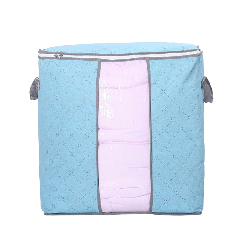 Storage Bag Quilt Storage Bag Moving Packing Bag Clothes Sorting Bag Clothing Duffel Bag in blue with pink interior.