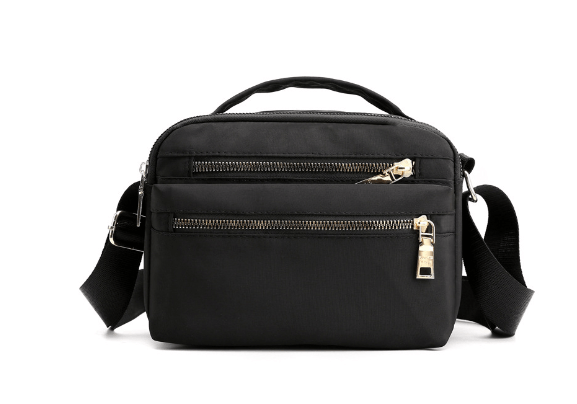 Stylish waist bag for outdoor activities, featuring durable nylon, dual zippers, and a sleek design, perfect for travel.