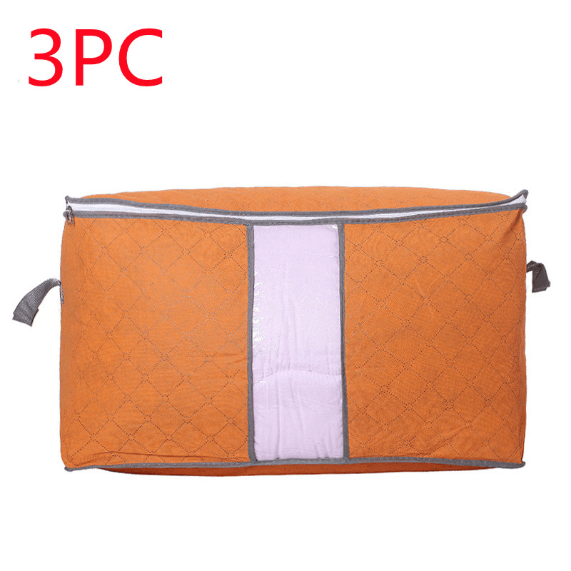 Storage Bag Quilt Storage Bag Moving Packing Bag Clothes Sorting Bag Clothing Duffel Bag in orange with handles.