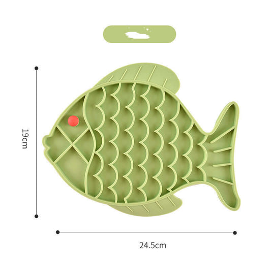 Silicone slow food plate for dogs in fish shape, green color, promotes healthy eating habits.