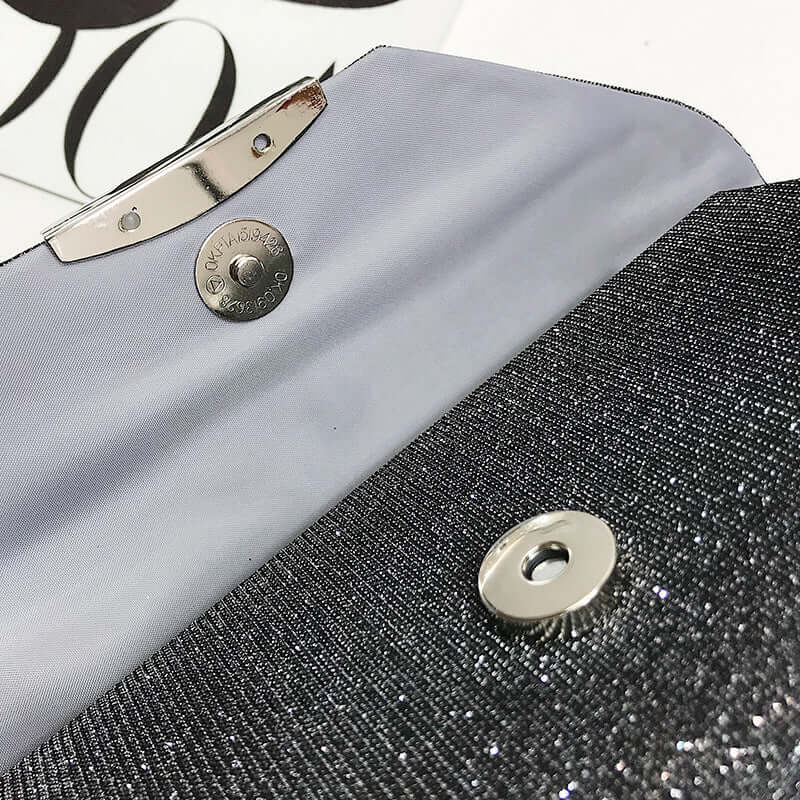 Interior view of an elegant evening clutch bag showcasing its chic design and quality materials.