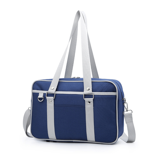 Versatile student shoulder bag in blue with gray straps, perfect for school and on-the-go activities.