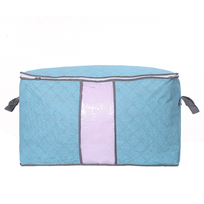 Storage Bag Quilt Storage Bag Moving Packing Bag Clothes Sorting Bag Clothing Duffel Bag in light blue color.