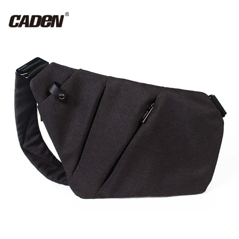 Versatile crossbody travel bag by CADEN, featuring a stylish and functional design in dark fabric.