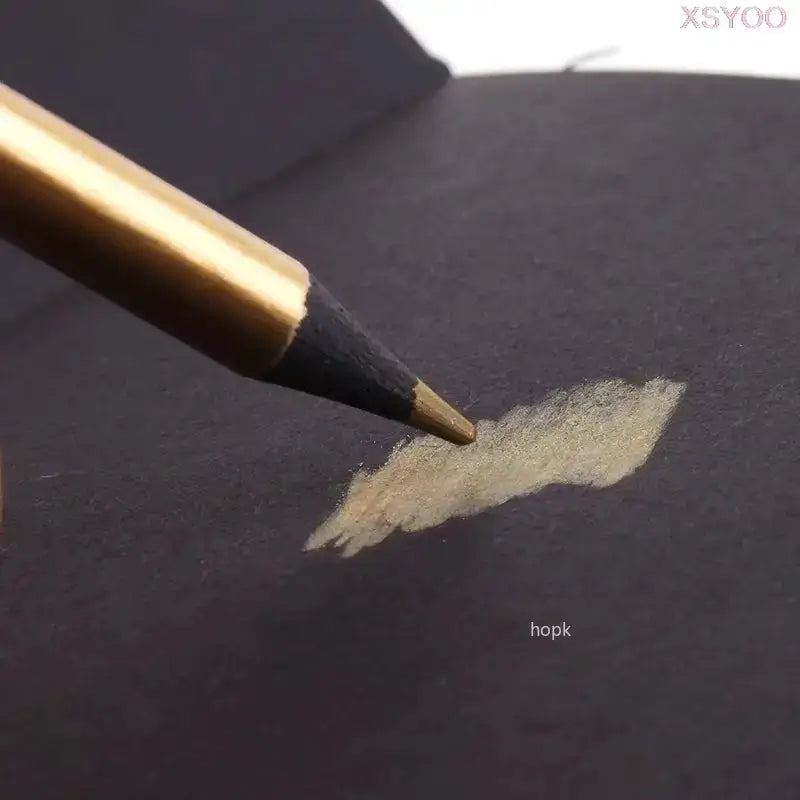 Close-up of metallic colored pencil drawing on black paper, showcasing the vibrant color from metallic colored pencils set.