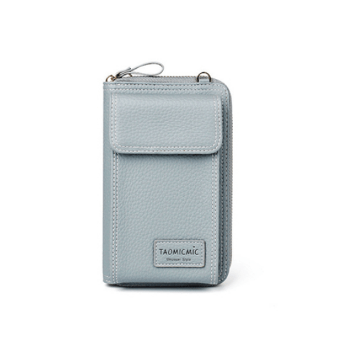 Crossbody shoulder bag in light blue, designed for style and functionality, featuring a secure zipper and organized compartments.