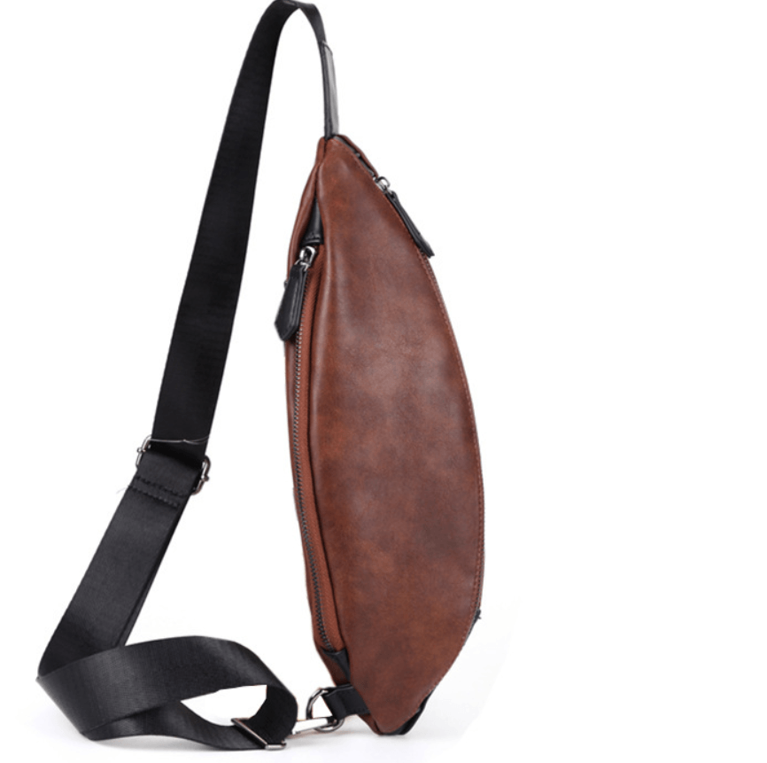 Versatile waist bag in brown PU leather, designed for style and functionality with a secure zipper closure.