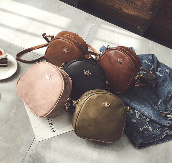 Chic crossbody shoulder bag collection featuring five stylish mini bags in various colors.
