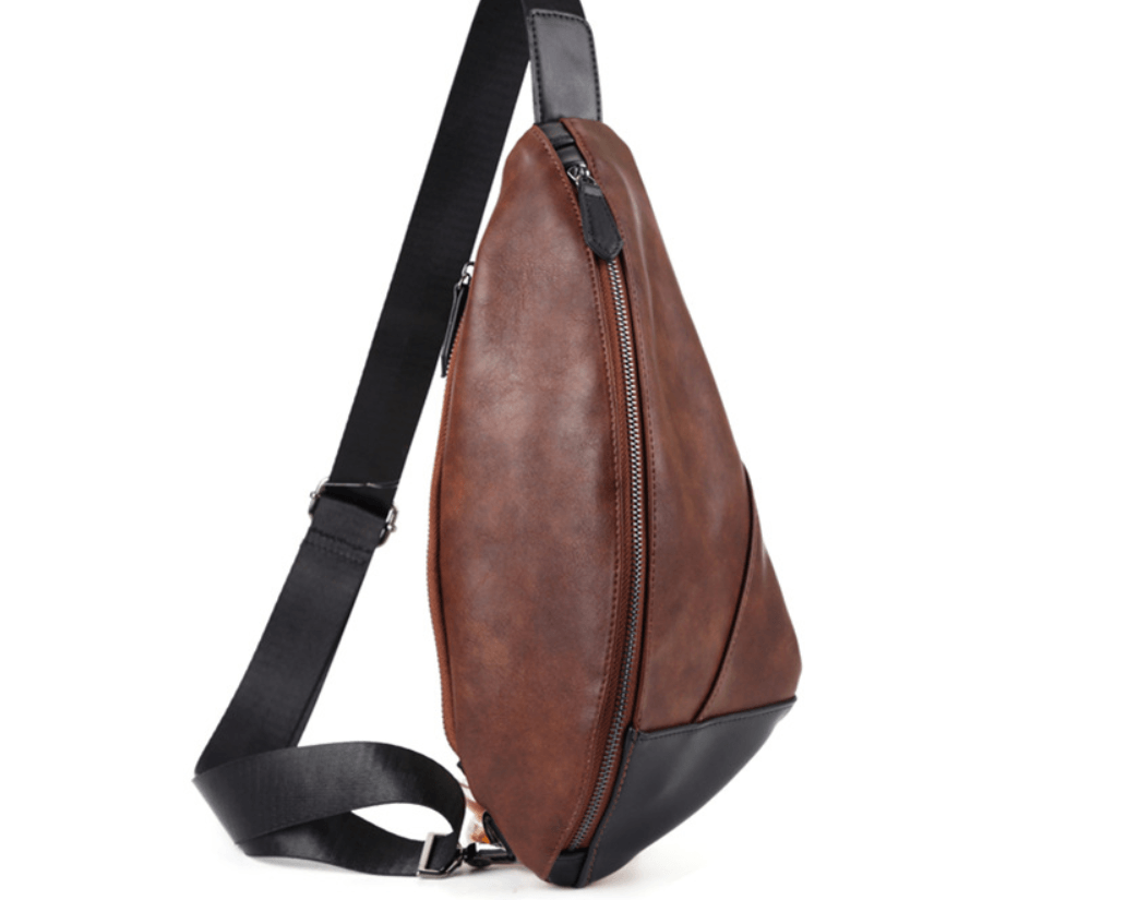 Versatile waist bag in brown PU leather with a stylish design and secure zipper buckle.