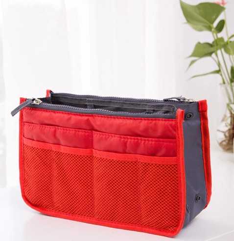 Compact red and gray makeup organizer bag with pockets, ideal for cosmetics and accessories storage.