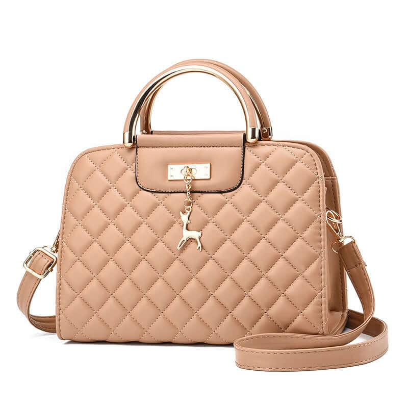 Fashionable quilted leather shoulder bag in tan, featuring a stylish diamond pattern and gold detailing.