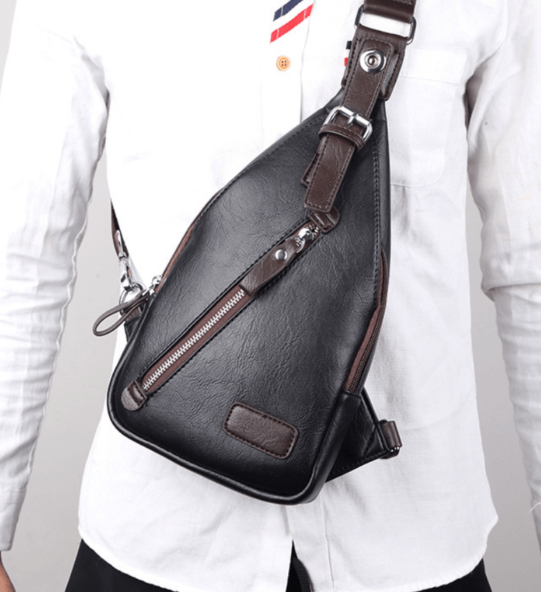 Versatile waist bag worn crossbody, made from high-quality PU leather with organized compartments.