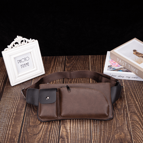 Versatile waist bag made of high-quality PU leather in brown color, featuring a zipper buckle opening for secure storage.