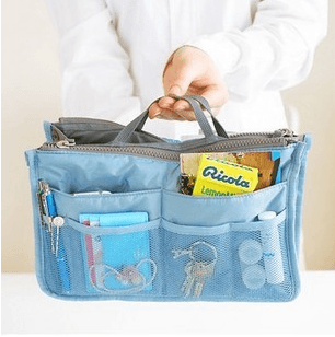 Stylish makeup organizer bag with multiple compartments for storing cosmetics, travel essentials, and daily accessories.