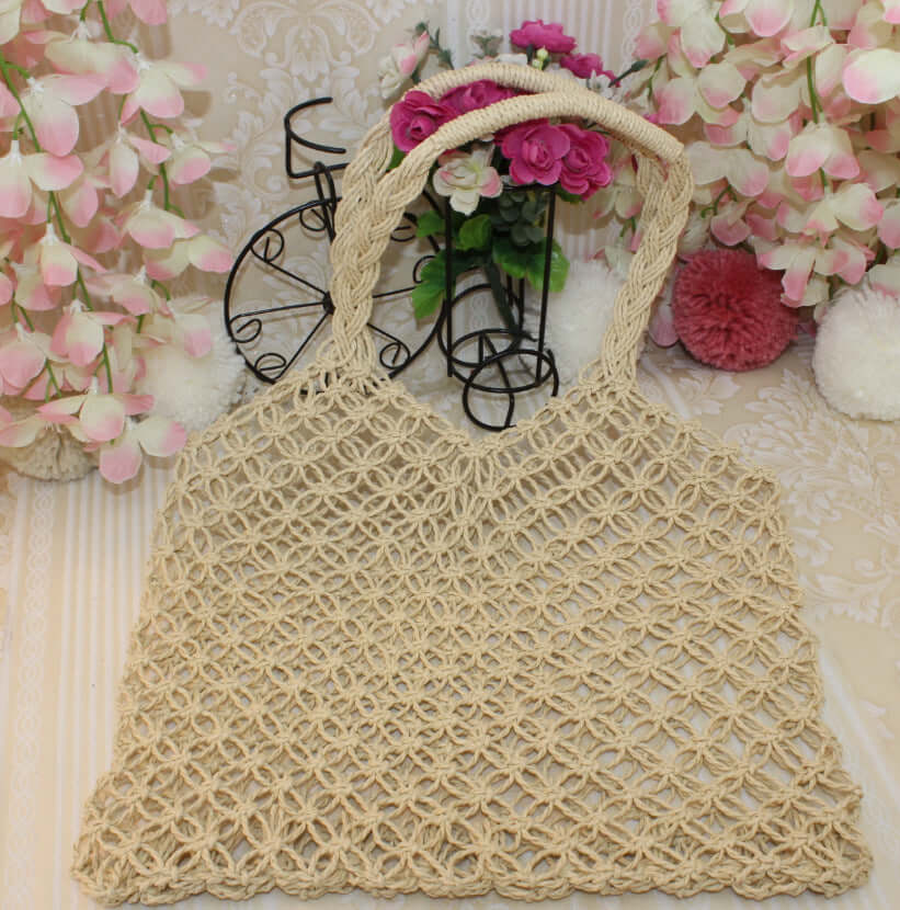 Stylish woven straw bags featuring a beautifully crafted woven grass design, ideal for casual outings and beach trips.