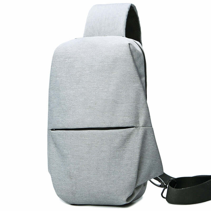 stylish chest bags collection featuring a modern gray crossbody design with secure zipper opening.