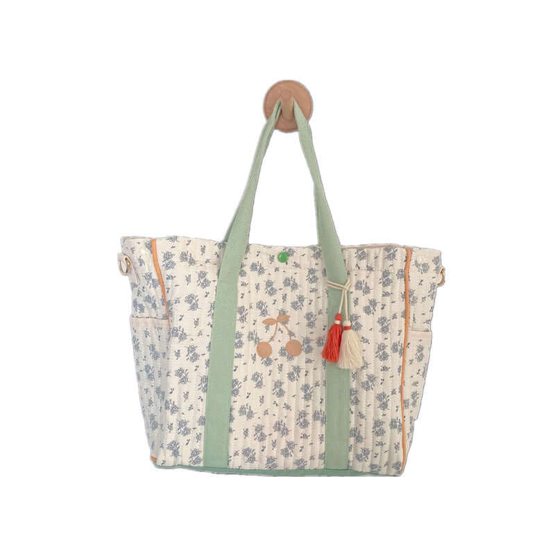 Large Capacity Floral Cherry Embroidered Mommy Bag with tassel detail and floral design.