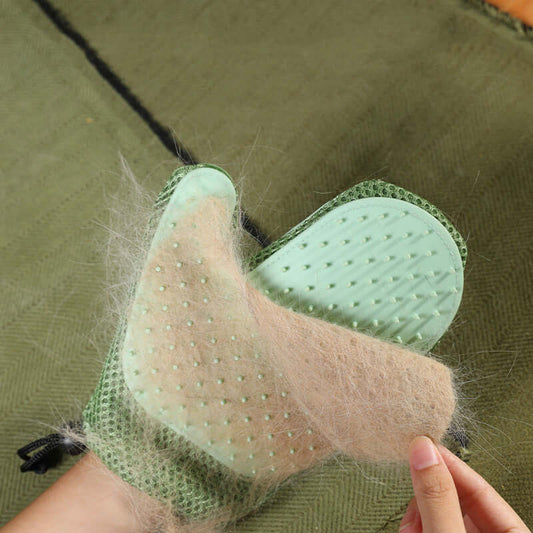 Silicone massage gloves for pet grooming removing hair from a pet's coat, showcasing effectiveness and ease of use.