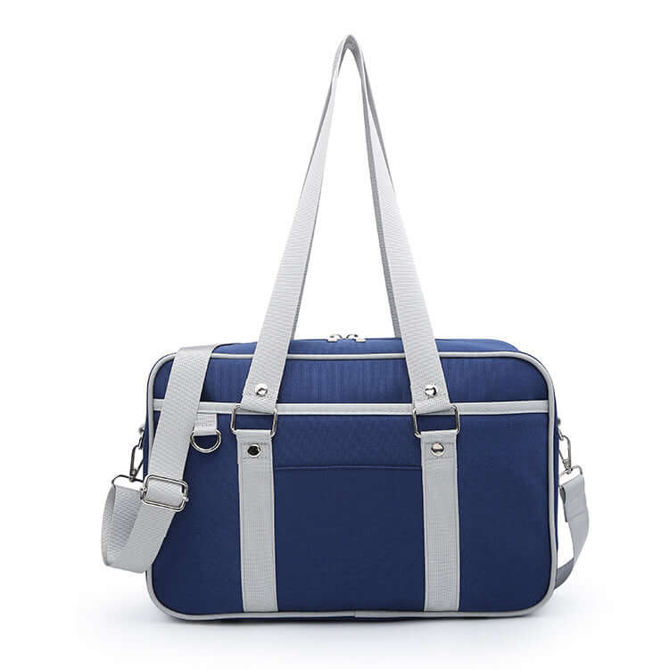 Versatile student shoulder bag in navy blue with stylish gray straps and multiple compartments.
