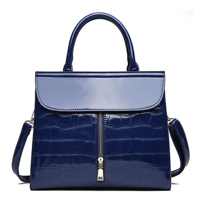 Fashionable shoulder crossbody tote bag for women in glossy navy finish with zipper detail.