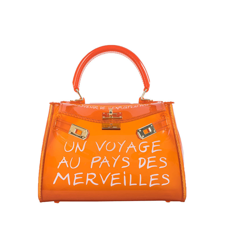 Jelly shoulder bag in vibrant orange with playful text, perfect for adding a chic touch to your outfit.