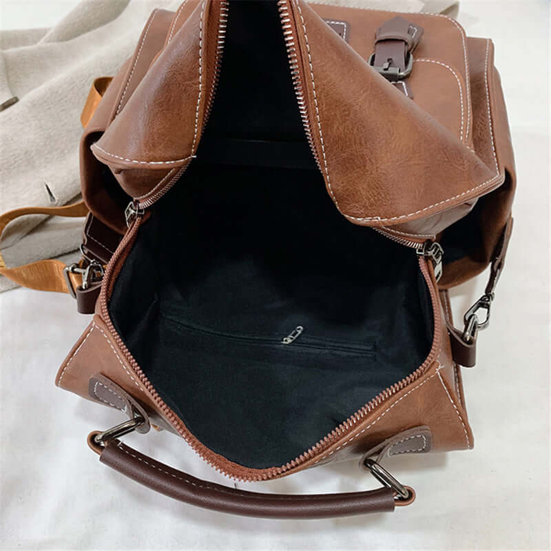 Trendy Vintage PU Leather Women's Backpack for Travel showing interior design in brown color.